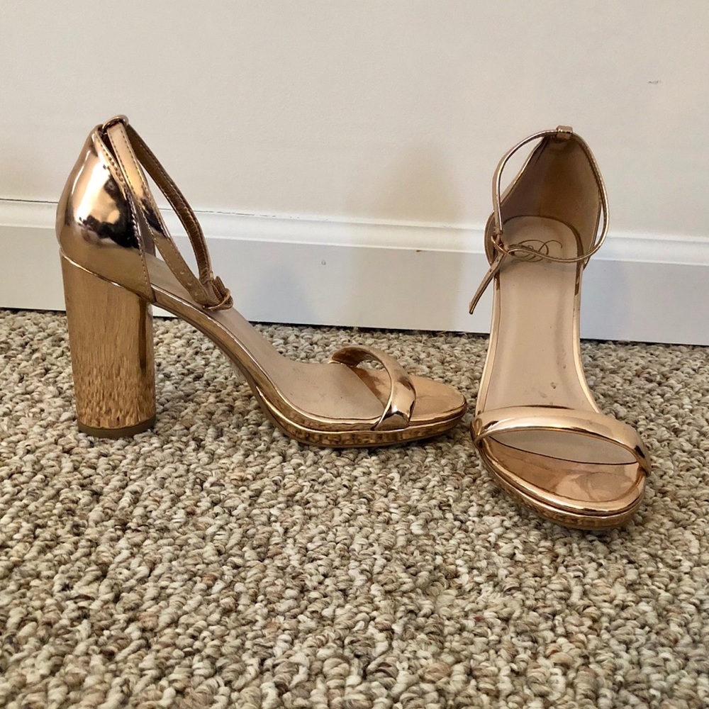 Gold open toe pumps